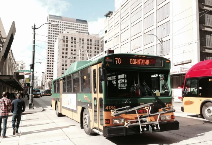 Metro Trolley labeled as Route 70, traveling on 3rd Avenue crossing University Street
