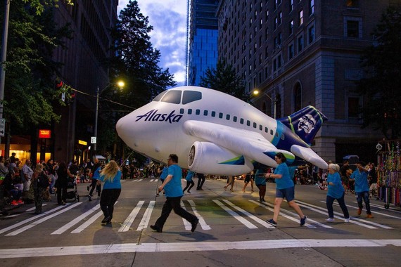 Alaska Airlines float carried on downtown Seattle streets by thier employees in the Torchlight Parade
