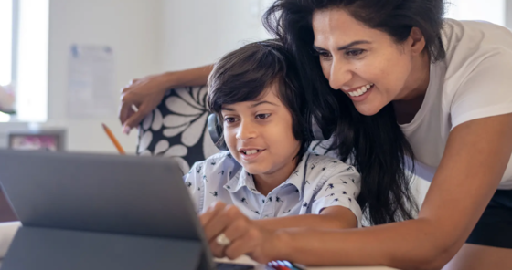 Parent and child on tablet