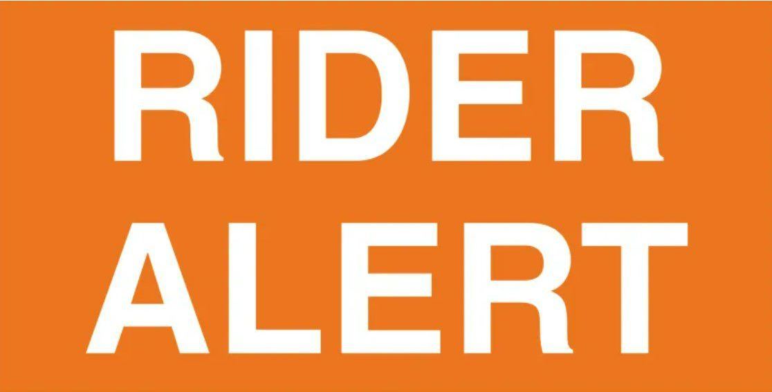 Orange background with large white text that reads, "RIDER ALERT"