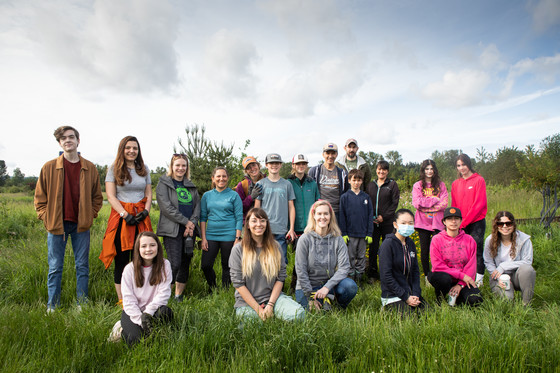group sitting in grass