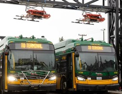 two battery-electric buses parked at Metro's south training facilities charging station