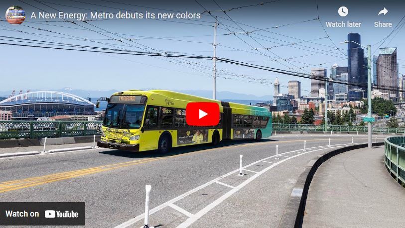 Screenshot of youtube video click to go to video. Image on bus with new livery neon yellow and green.