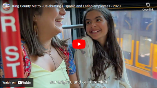 Metro Latinx shows woman and girl smiling at eachother