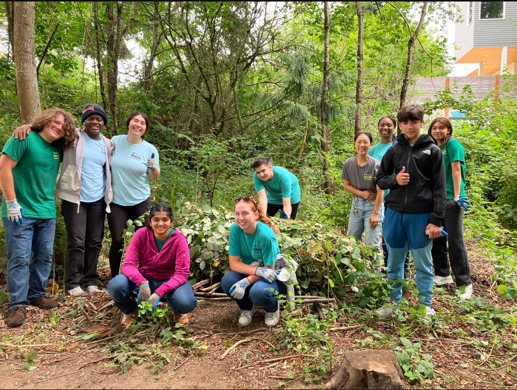 Youth conservation corps groups on an outing in the woods