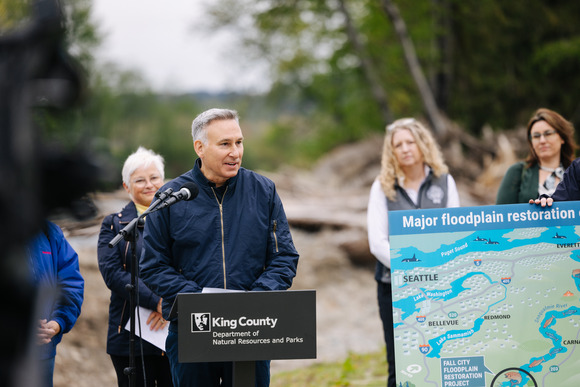 Executive Constantine delivers remarks at a floodplain restoration project. 