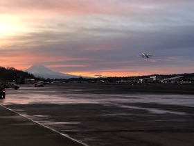 Plane takes off with Mt Rainier in background