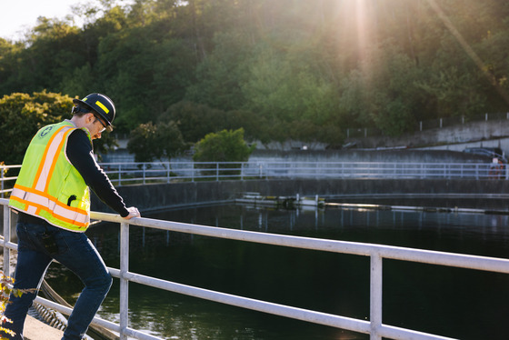 A West Point maintenance staff member looks into a circular clarifier while making the rounds on a lovely morning. 