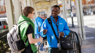 image of a safety ambassador talking to a Metro rider