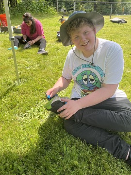 youth brushing boots