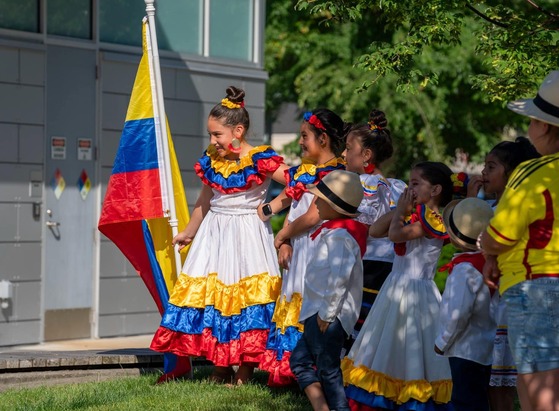 Kids in traditional Colombian clothes at a previous Colombian Independence Day celebration