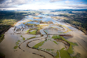 Aerial image of flooded river in an agricultural area