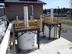 Odor control facility with two tanks for air treatment.