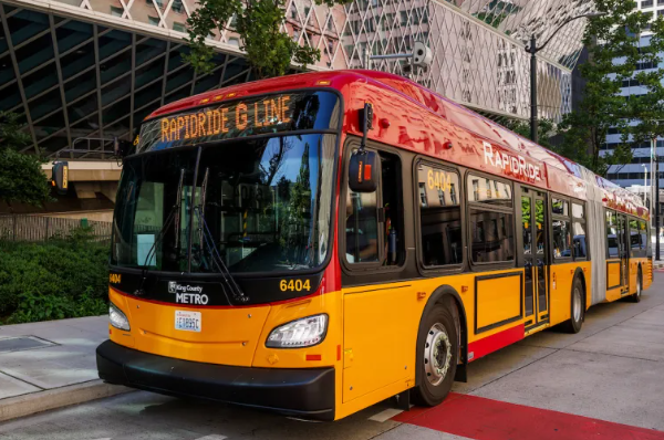 imapge of G Line Rapid Ride next to seattle public library