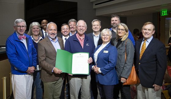 Councilmembers posing with Seattle Aquarium leadership to present One Ocean Day proclamation