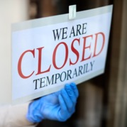 Sign saying "We are closed temporarily" 