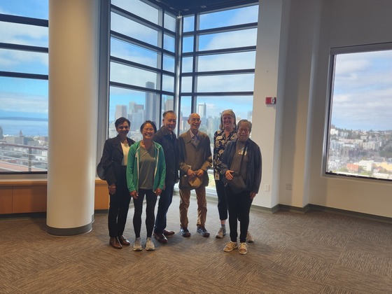 Councilmember Balducci with five community members at the Pacific Tower in Seattle