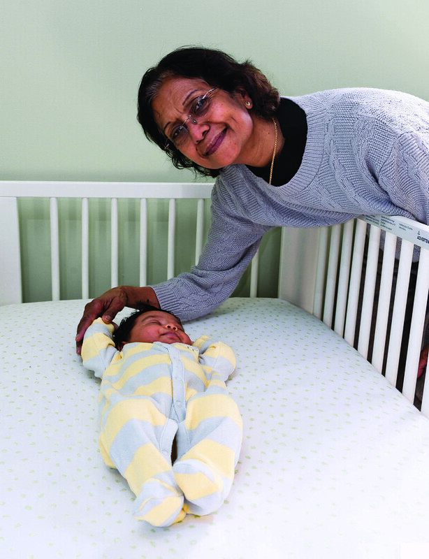 baby sleeping safely in crib