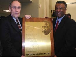 Former King County Councilmembers Bruce Laing and Ron Sims with a plaque renaming King County for Dr. Martin Luther King