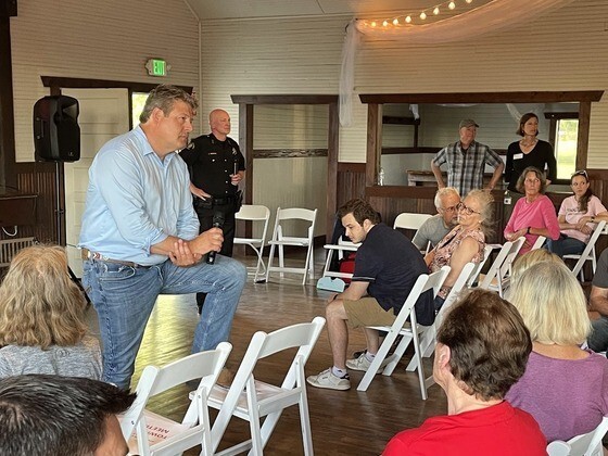 King County Councilmember Reagan Dunn speaks at the South Bellevue Town Hall 