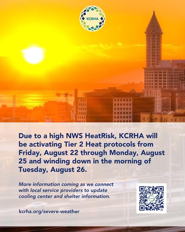 An image of the sun setting over Elliott Bay with the Smith Tower in the foreground with the severe weather info underneath