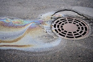 Oil on water flowing into a storm drain