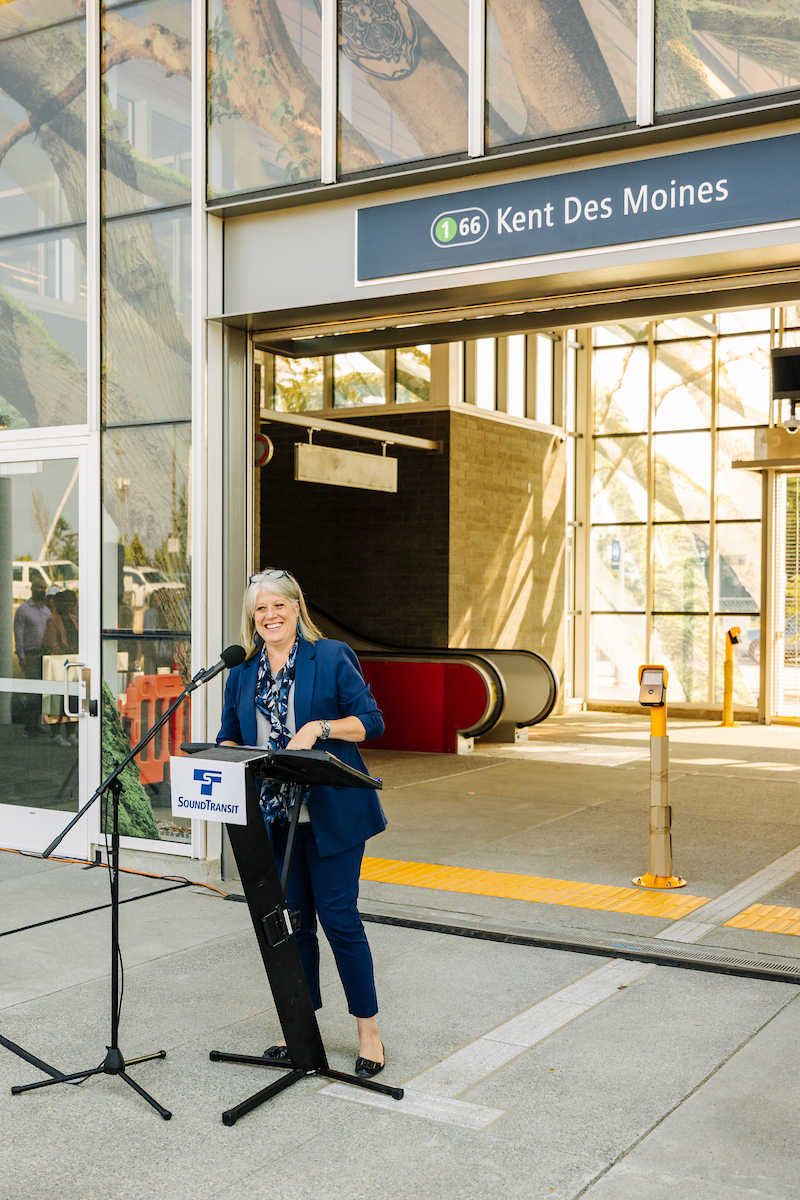 Councilmember Balducci in front of the Kent Des Moines Light Rail Station