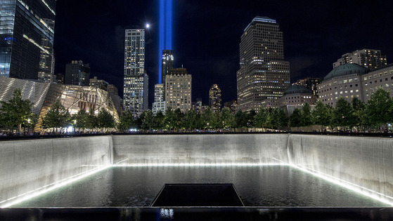 A photo of the 9/11 Memorial reflecting pool during the "Tribute in Light" 