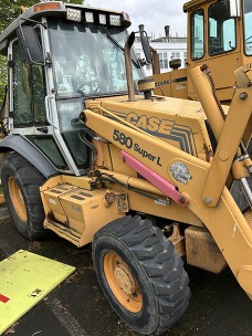 an old yellow backhoe