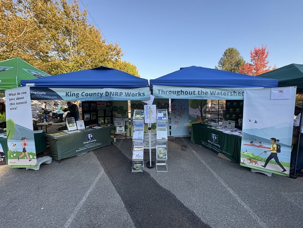 A photo of the WTD/DNRP Booth at Salmon Days Festival in Issaquah.