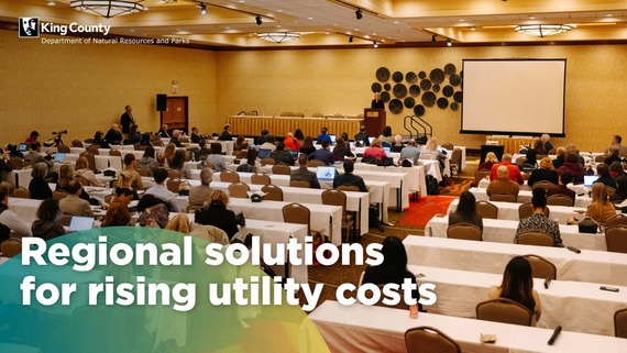 Regional solutions to utility costs text overlay on photo of a summit