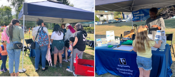 A group of adults and children gather under a canopy at a community event