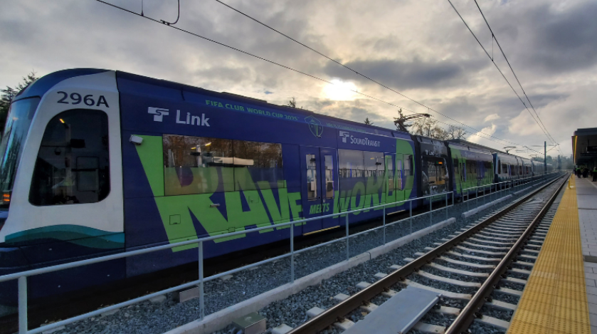 image of link light rail with Link wrapped in Sounder wraps 