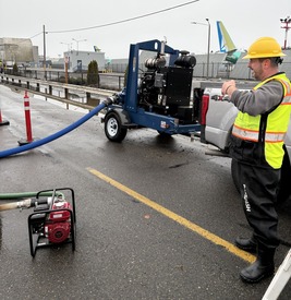 KCIA equipment at Renton with man standing