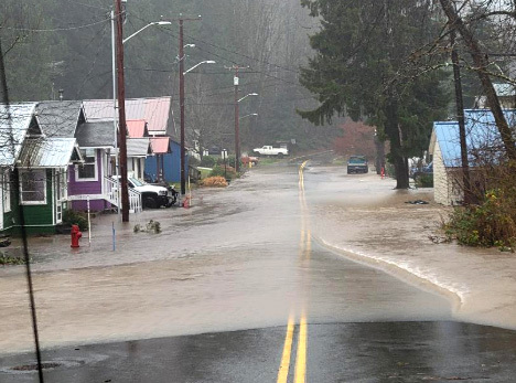 Flooded road and properties