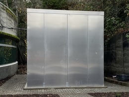 A metal structure that is the outer shell of the completed fire suppression system.