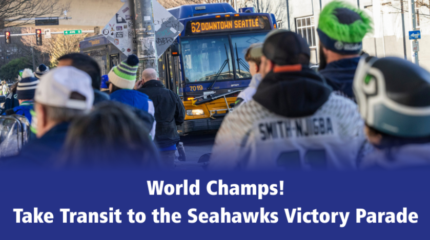 picture os KCM bus and seahawks fans with text: World Champs! Take Transit to the Seahawks Victory Parade 