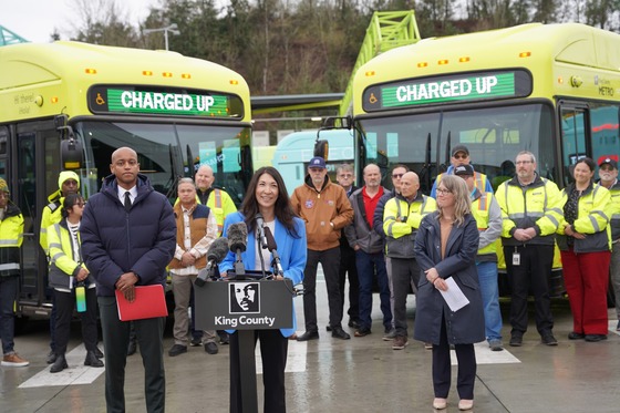 Councilmember Fain at a Press Conference in front of the electric buses