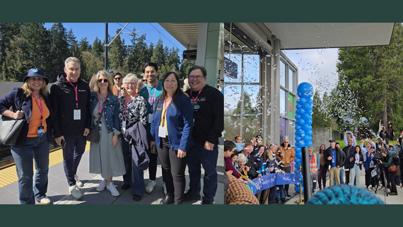 Seven people standing on a light rail train platform and smiling.