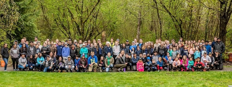 A large group of people smiling in a Kirkland park