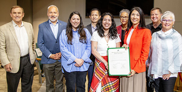 Councilmembers with representatives from the AANHPI community.