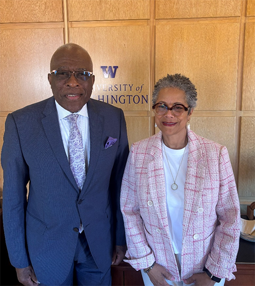 Councilmember Lewis standing with UW president Robert J. Jones.