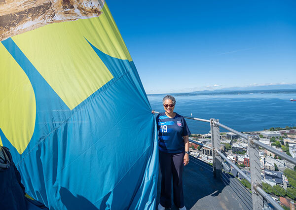 photo of CM Rhonda Lewis on top of the Space Needle