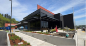 An image of the new administrative building with black and red accents at the new South County Recycling and Transfer Station in Algona.