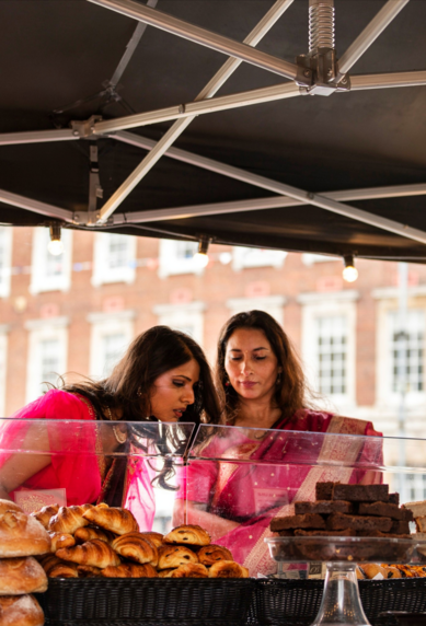 People buying baked goods