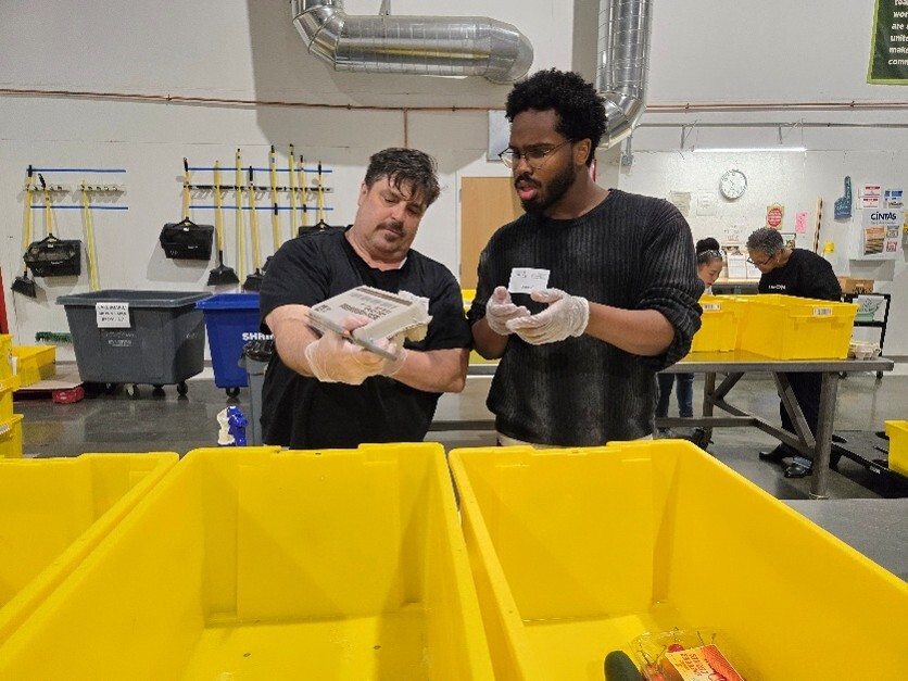 D2 Staff volunteering at Food Lifeline