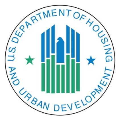 Circular logo with blue and green text inside reading U.S. Department of Housing and Urban Development.