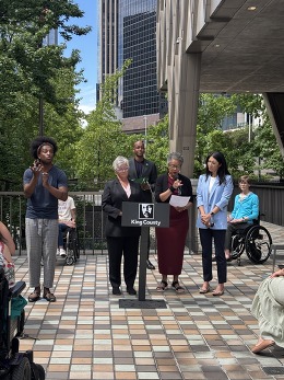 CM Lewis alongside CM Perry (D3) and CM Fain (D5) at the Disability PRIDE Flag Raising event