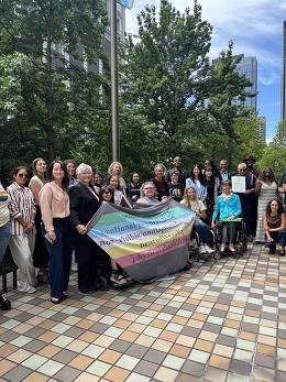 CM Lewis amongst community at the Disability Pride Flag Raising