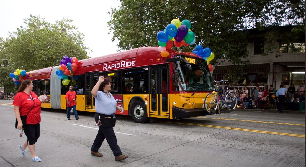 photo og Metro RapidRide bus in torchlight parade